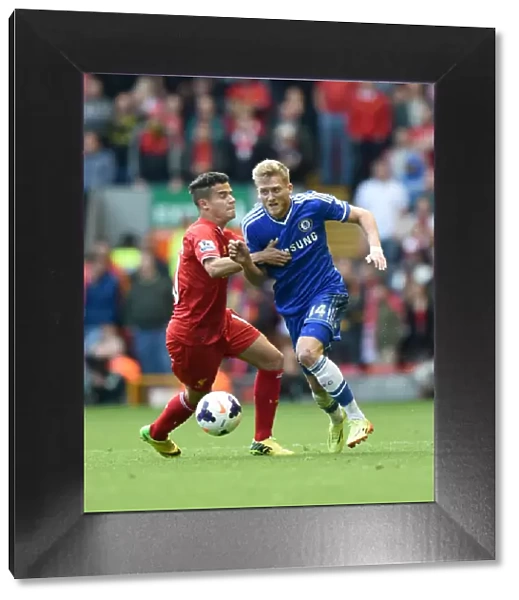 Battle for the Ball: Schurrle vs. Coutinho - Liverpool vs. Chelsea, Premier League Rivalry at Anfield