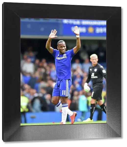Didier Drogba's Triumphant Moment: Chelsea's Legendary Striker Celebrates Victory Over Leicester City (August 23, 2014)