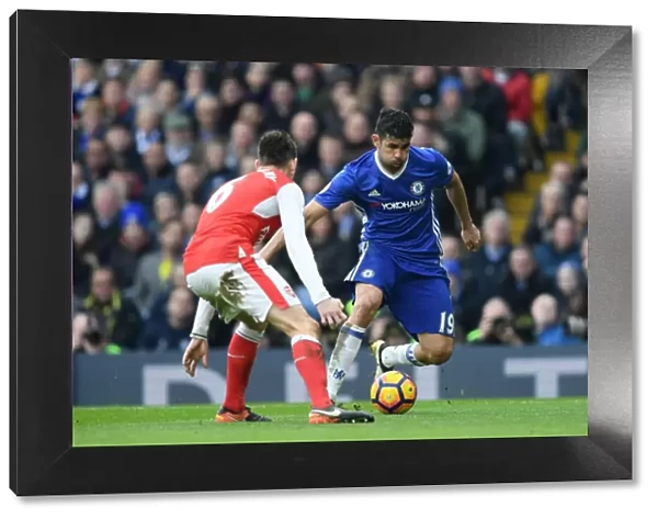 Battle at Stamford Bridge: Diego Costa vs. Laurent Koscielny - Intense Rivalry between Chelsea and Arsenal Players