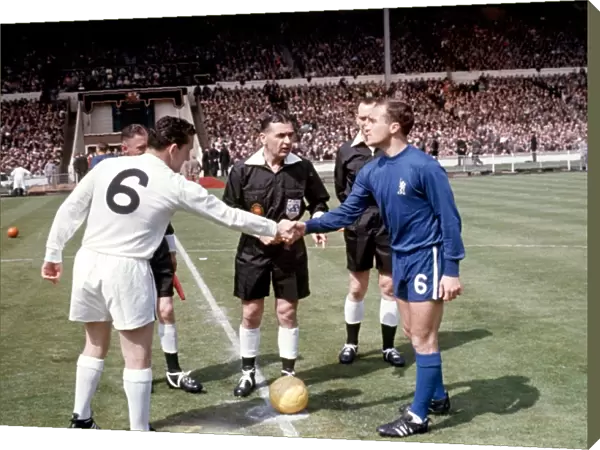 The 1960s FA Cup Final: A Historic Moment as Captains Dave Mackay of Tottenham Hotspur and Ron Harris of Chelsea Share a Handshake Before the Match