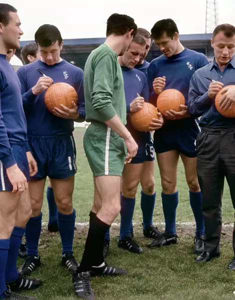 Footballers of Chelsea's Division One Team Signing Footballs Before FA Cup Final: Ron Harris, John Boyle, Peter Bonetti, Alan Harris, and Tommy Docherty