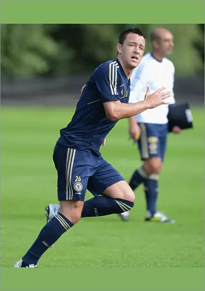 John Terry in Action: Chelsea FC Training Session at Cobham, August 2012