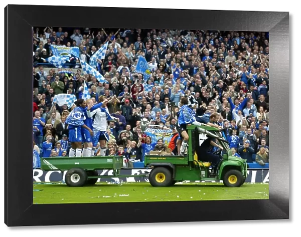 Chelsea's Premier League Champions: A Unique Victory Celebration with Huth, Cudicini, Carvalho, Pidgeley, Forsell, and Drogba on a Tractor