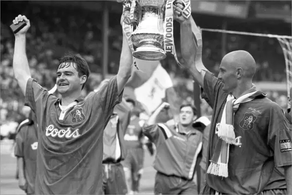 Chelsea's Glory: Clarke and Leboeuf Celebrate FA Cup Victory (1990's)