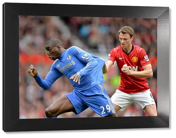 Clash at Old Trafford: Demba Ba vs. Jonny Evans - Manchester United vs. Chelsea, Premier League Showdown (5th May 2013)