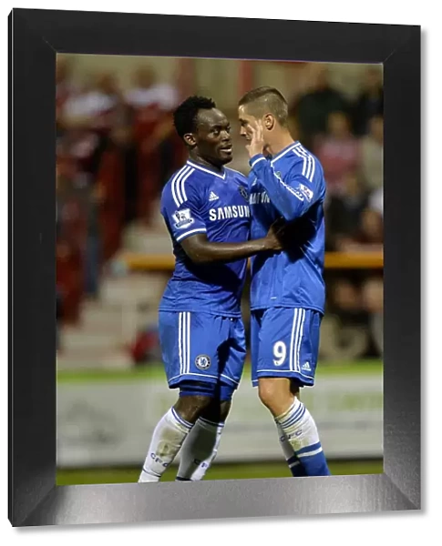 Fernando Torres and Michael Essien Celebrate First Goal for Chelsea Against Swindon Town in Capital One Cup