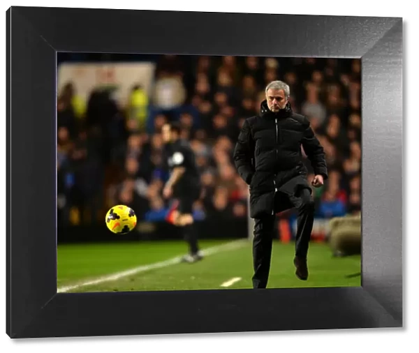 Jose Mourinho in Action: Chelsea Boss Masterfully Controls Ball on Touchline Amidst Chelsea vs. West Ham United, Barclays Premier League (January 29, 2014)