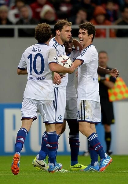 Chelsea's Ramires and Team-Mates Celebrate Third Goal in UEFA Champions League Match Against Steaua Bucharest (October 2013)