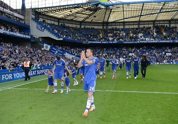 John Terry's Triumphant Moment: Chelsea Players Celebrate with Fans after Norwich City Victory (BPL 2014)