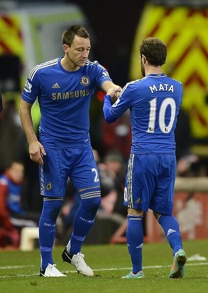 Juan Mata Transfers Chelsea Captain Armband to John Terry During Substitution at Stoke City (January 12, 2013)