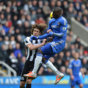 Aerial Battle: Coloccini vs. Ba in Intense Newcastle United vs. Chelsea Clash (February 2013)