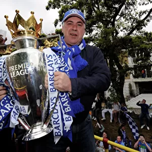 Chelsea FC: Premier League Champions - Carlo Ancelotti Celebrates with the Trophy at Victory Parade in London, 2010
