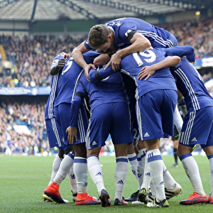 Chelsea's Double Delight: Eden Hazard and Teammates Celebrate at Stamford Bridge after Scoring Against Leicester City (Premier League)