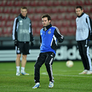 Juan Mata's Intense Focus: Chelsea FC Training Before UEFA Europa League Match at Generali Arena