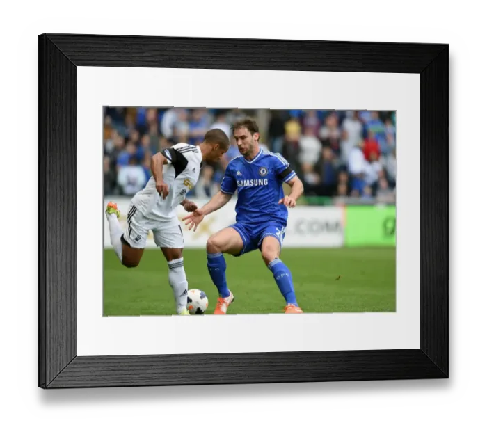 Framed Print : Battle for the Ball: Wayne Routledge vs. Branislav Ivanovic - Swansea City vs. Chelsea, Premier League (April 13, 2014) Framed Print : Battle for the Ball: Wayne Routledge vs. Branislav Ivanovic - Swansea City vs. Chelsea, Premier League (April 13, 2014)