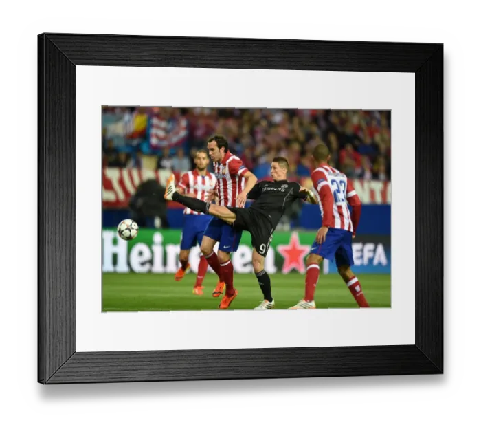 Framed Print : Battle for the Ball: Diego Godin vs. Fernando Torres in the Intense UEFA Champions League Semi-Final Clash at Vincente Calderon Stadium (April 22, 2014) Framed Print : Battle for the Ball: Diego Godin vs. Fernando Torres in the Intense UEFA Champions League Semi-Final Clash at Vincente Calderon Stadium (April 22, 2014)