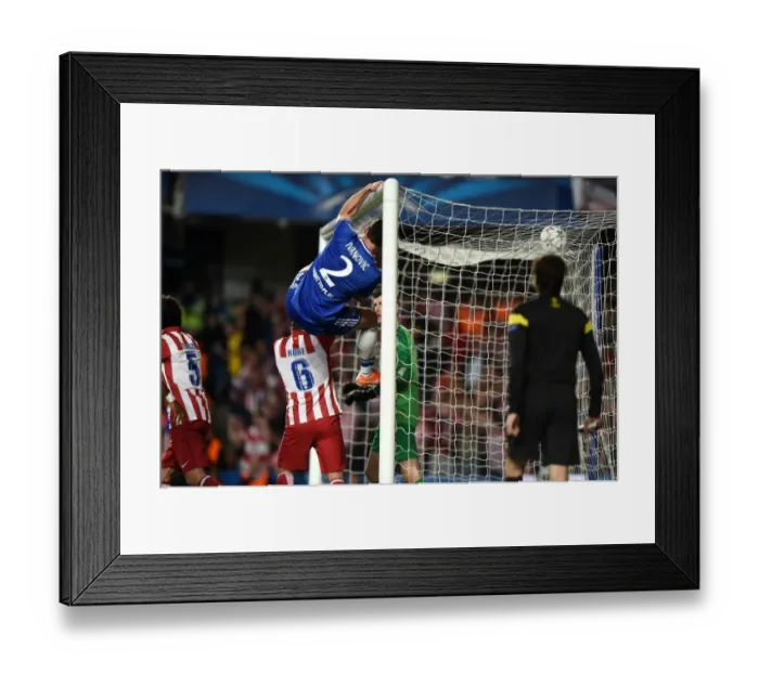 Framed Print : Ivanovic's Dramatic Glancing Save: Chelsea Denies Atletico Madrid in UEFA Champions League Semi-Final (April 30, 2014)
