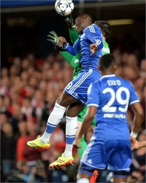 Aerial Clash: Demba Ba vs. Thibaut Courtois, Chelsea vs. Atletico Madrid, UEFA Champions League Semi-Final, Stamford Bridge (30th April 2014)