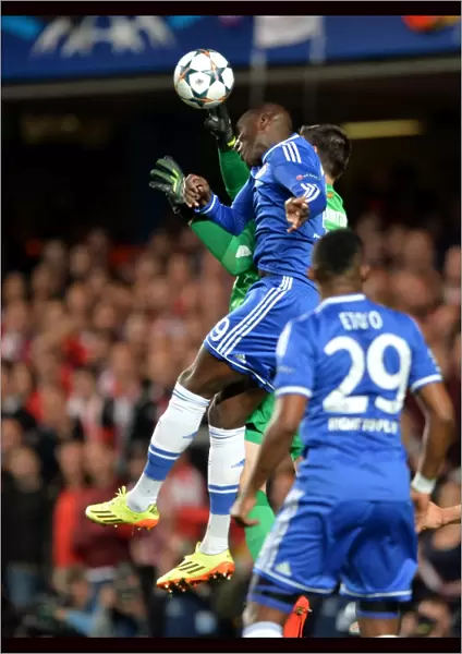 Aerial Clash: Demba Ba vs. Thibaut Courtois, Chelsea vs. Atletico Madrid, UEFA Champions League Semi-Final, Stamford Bridge (30th April 2014)