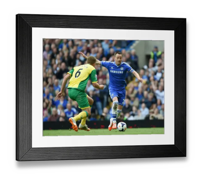Framed Print : Battle for the Ball: John Terry vs. Michael Turner - Chelsea vs. Norwich City, Premier League Rivalry (4th May 2014)