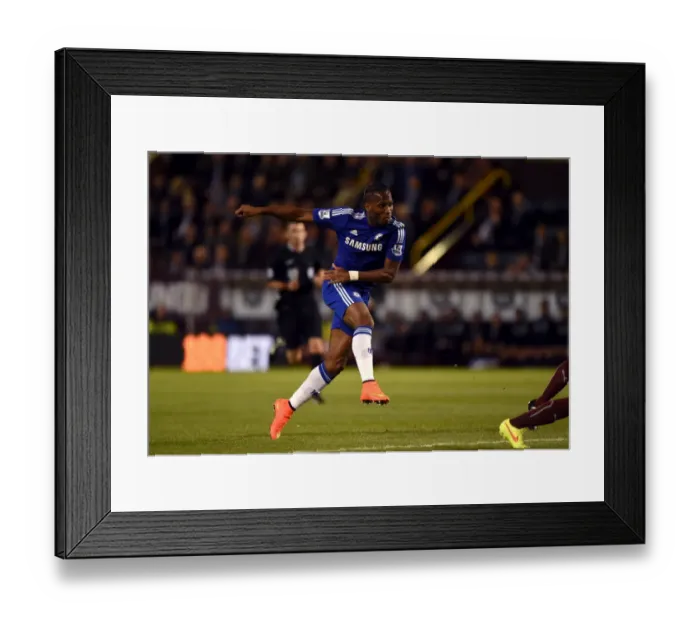 Framed Print : Didier Drogba's Dramatic Shot: Chelsea's Victory at Turf Moor (18th August 2014) Framed Print : Didier Drogba's Dramatic Shot: Chelsea's Victory at Turf Moor (18th August 2014)