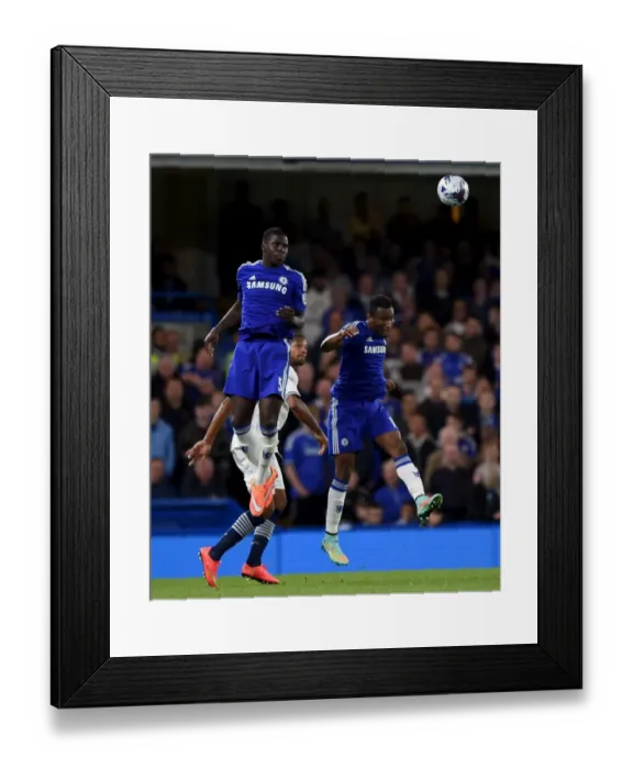 Framed Print : Chelsea's Zouma and Mikel Take on Bolton's Beckford: Intense Moment from the Capital One Cup Third Round at Stamford Bridge