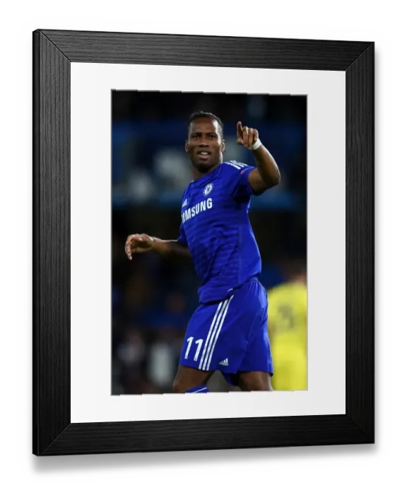 Framed Print : Didier Drogba's Thrilling Double: Chelsea's Star Forward Celebrates Second Goal vs. NK Maribor in UEFA Champions League (October 21, 2014) Framed Print : Didier Drogba's Thrilling Double: Chelsea's Star Forward Celebrates Second Goal vs. NK Maribor in UEFA Champions League (October 21, 2014)