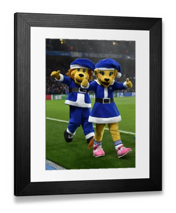 Framed Print : Santa's Lion Pride: Bridgette and Stamford of Chelsea FC Cheer on the Team during UEFA Champions League Match against Sporting Lisbon (December 10, 2014) Framed Print : Santa's Lion Pride: Bridgette and Stamford of Chelsea FC Cheer on the Team during UEFA Champions League Match against Sporting Lisbon (December 10, 2014)