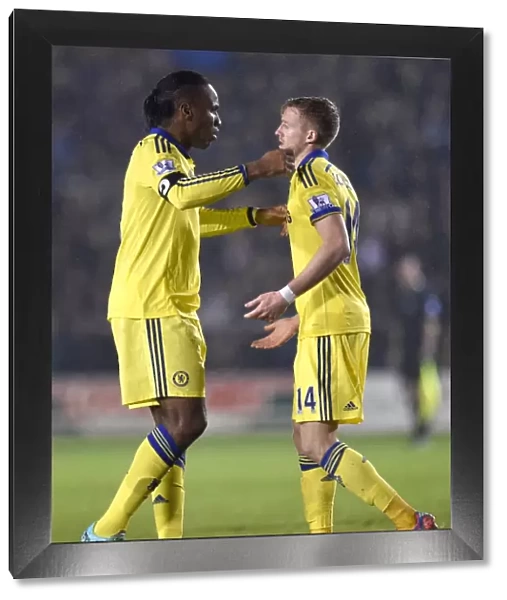 Chelsea's Unstoppable Duo: Drogba and Schurrle Secure Victory Over Shrewsbury Town in the Capital One Cup