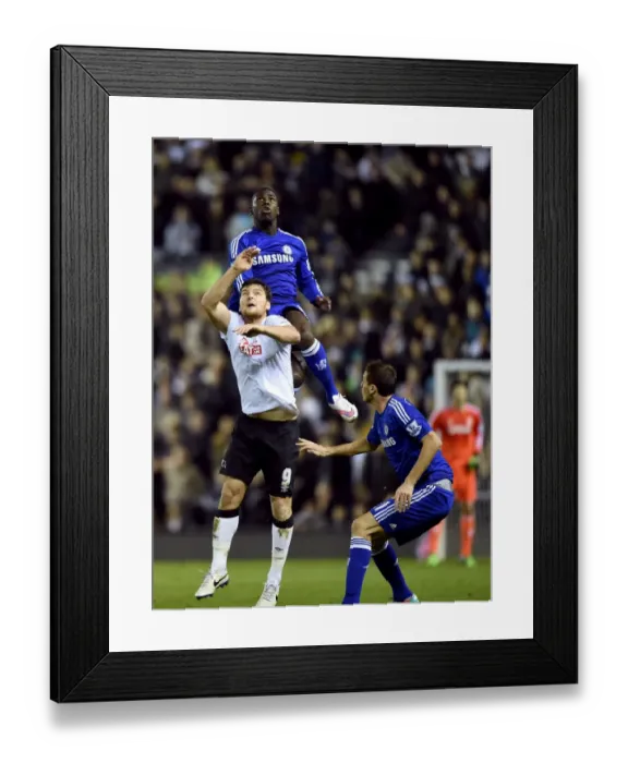Framed Print : Intense Battle for the Ball: Zouma vs. Martin - Derby County vs. Chelsea, Capital One Cup Quarter-Final (December 16, 2014)
