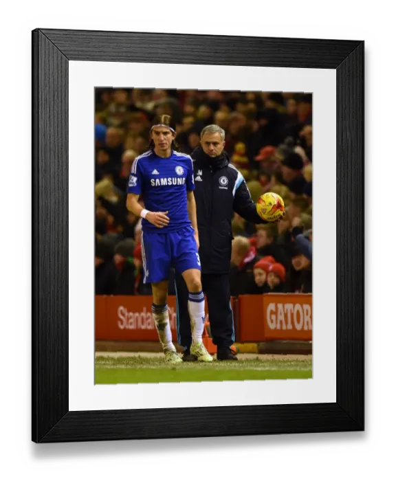 Framed Print : Jose Mourinho's Unwavering Focus: Chelsea Manager Holds the Ball Amidst the Intense Semi-Final Clash with Liverpool in Capital One Cup (Liverpool v Chelsea, 20th January 2015) Framed Print : Jose Mourinho's Unwavering Focus: Chelsea Manager Holds the Ball Amidst the Intense Semi-Final Clash with Liverpool in Capital One Cup (Liverpool v Chelsea, 20th January 2015)