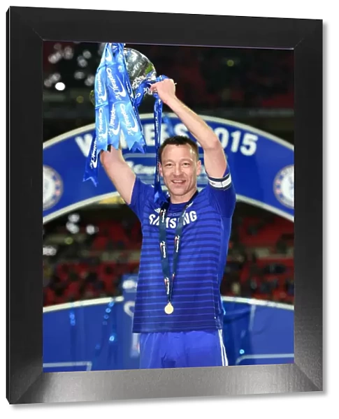 Chelsea's John Terry Lifts Carling Cup: Celebrating Victory over Tottenham Hotspur at Wembley Stadium (1st March 2015)
