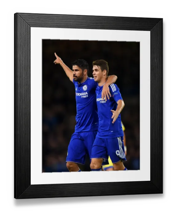 Framed Print : Chelsea's Triumphant Moment: Costa and Oscar Celebrate Goal in UEFA Champions League Victory (September 2015)