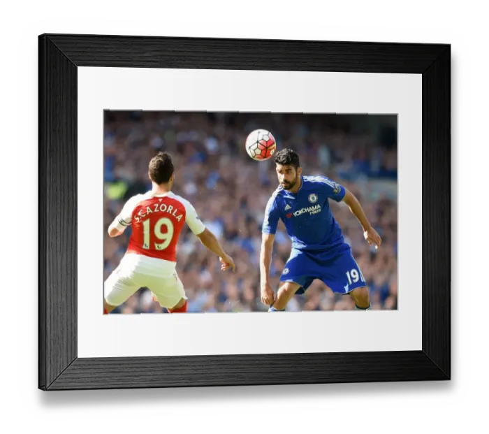 Framed Print : Diego Costa vs Santi Cazorla: A Premier League Rivalry Ignites at Stamford Bridge (September 2015) Framed Print : Diego Costa vs Santi Cazorla: A Premier League Rivalry Ignites at Stamford Bridge (September 2015)