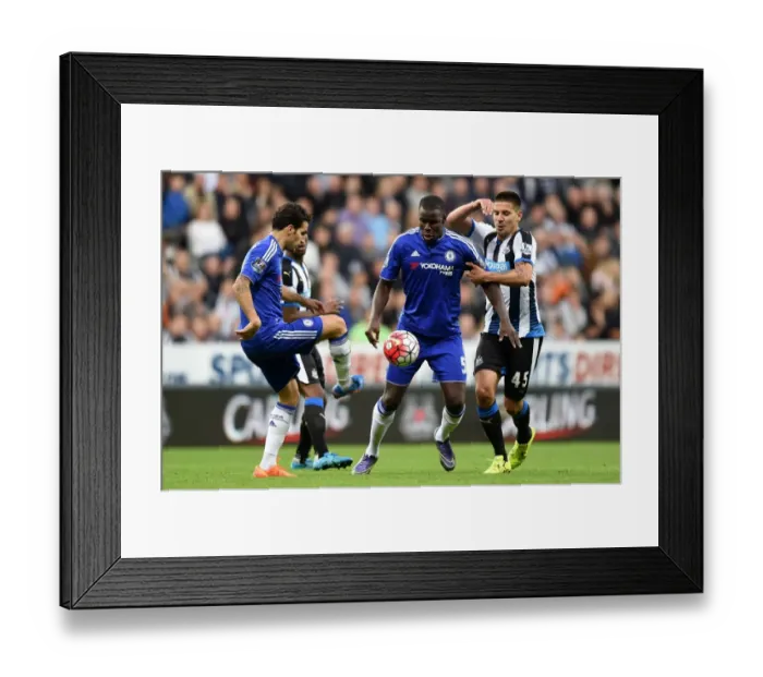 Framed Print : Clash at St. James Park: Mitrovic vs. Zouma and Fabregas - A Premier League Battle