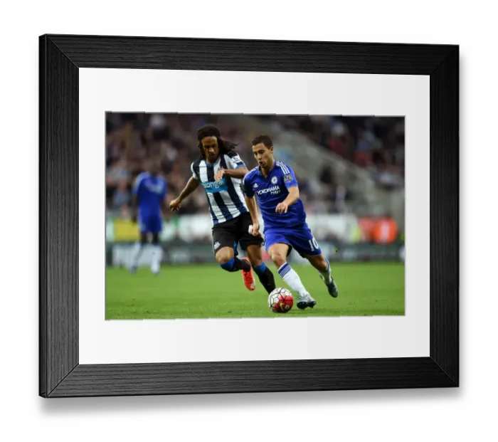 Framed Print : Intense Rivalry: Eden Hazard vs. Kevin Mbabu - A Football Battle for Ball Possession (September 2015)