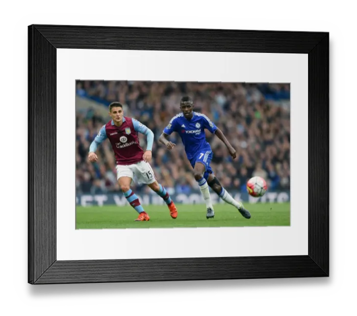 Framed Print : Battle for the Ball: Westwood vs. Ramires - A Premier League Rivalry Moment (October 2015)