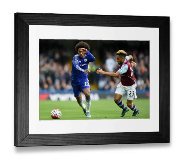 Framed Print : Intense Battle for Ball Possession: Willian vs. Amavi, Chelsea vs. Aston Villa (October 2015)