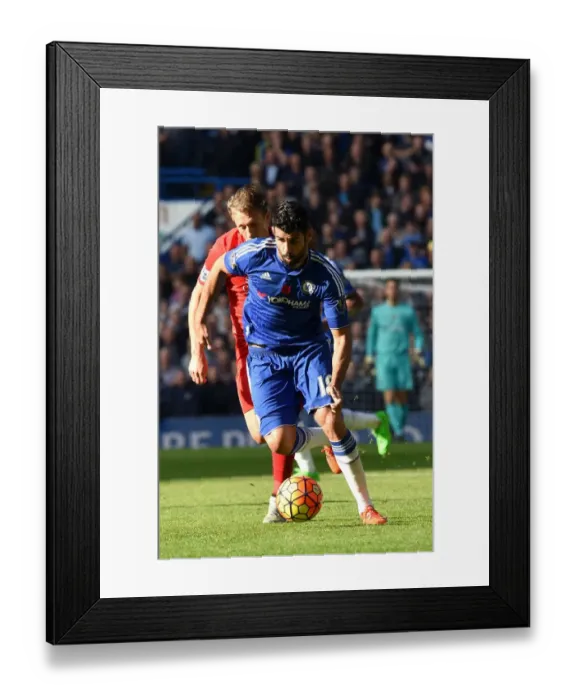 Framed Print : Battle for Supremacy: Diego Costa vs. Lucas Leiva - Chelsea vs. Liverpool: A Premier League Showdown Framed Print : Battle for Supremacy: Diego Costa vs. Lucas Leiva - Chelsea vs. Liverpool: A Premier League Showdown