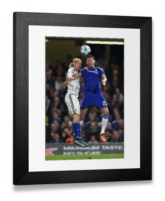Framed Print : Clash at Stamford Bridge: Aerial Battle between Chelsea's Nemanja Matic and Dynamo Kiev's Domagoj Vida in the UEFA Champions League Framed Print : Clash at Stamford Bridge: Aerial Battle between Chelsea's Nemanja Matic and Dynamo Kiev's Domagoj Vida in the UEFA Champions League