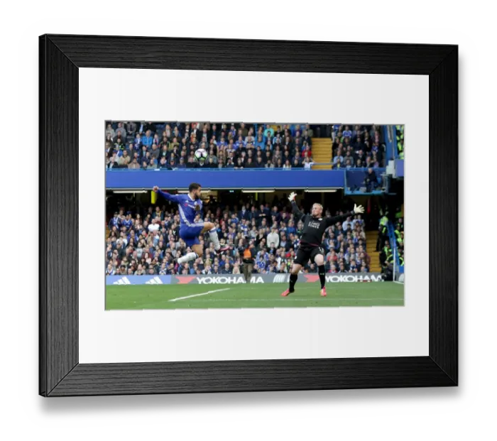 Framed Print : Hazard's Dramatic Dodge: A Premier League Showdown - Schmeichel's Last-Ditch Save