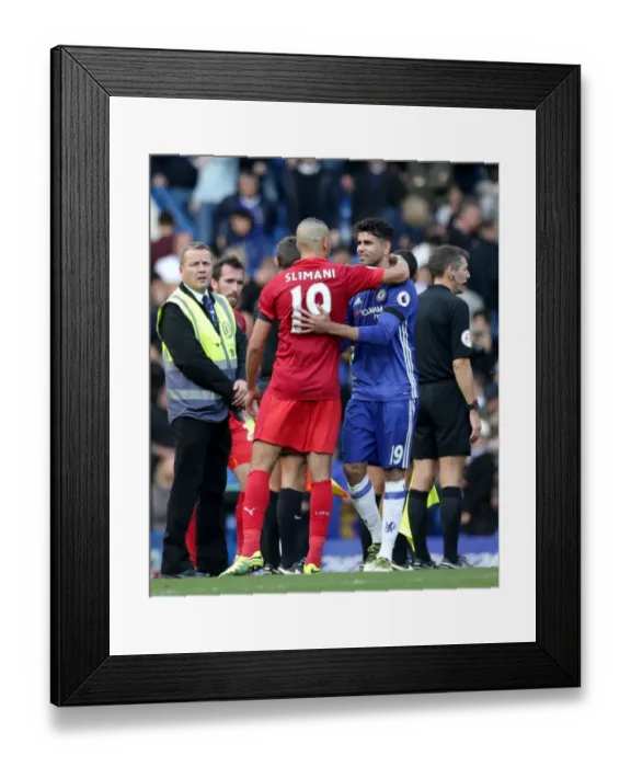 Framed Print : Sportsmanship on the Pitch: Costa and Slimani's Heartwarming Embrace After Chelsea vs. Leicester City