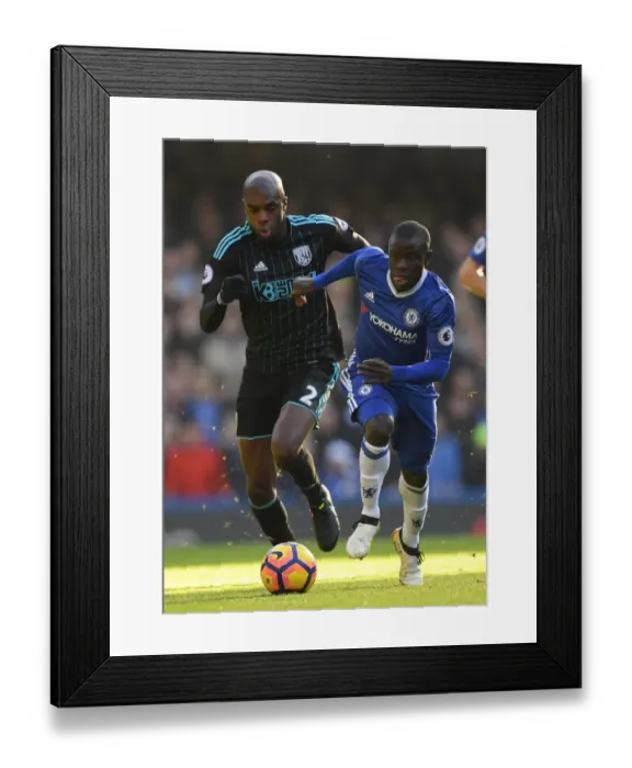 Framed Print : Clash at Stamford Bridge: Kante vs. Nyom - Premier League Showdown Framed Print : Clash at Stamford Bridge: Kante vs. Nyom - Premier League Showdown