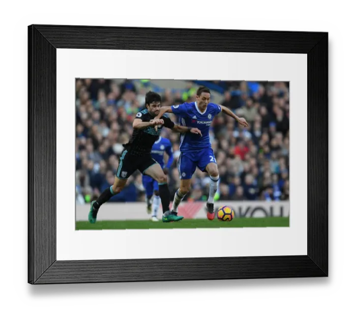 Framed Print : Nemanja Matic Stands Firm Against Claudio Yacob's Pressure at Stamford Bridge