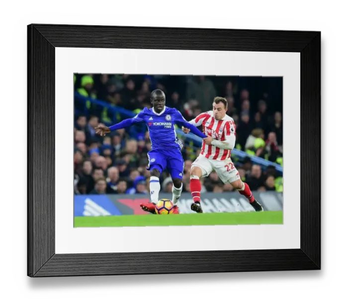Framed Print : Kante vs. Shaqiri: A Premier League Battle at Stamford Bridge Framed Print : Kante vs. Shaqiri: A Premier League Battle at Stamford Bridge