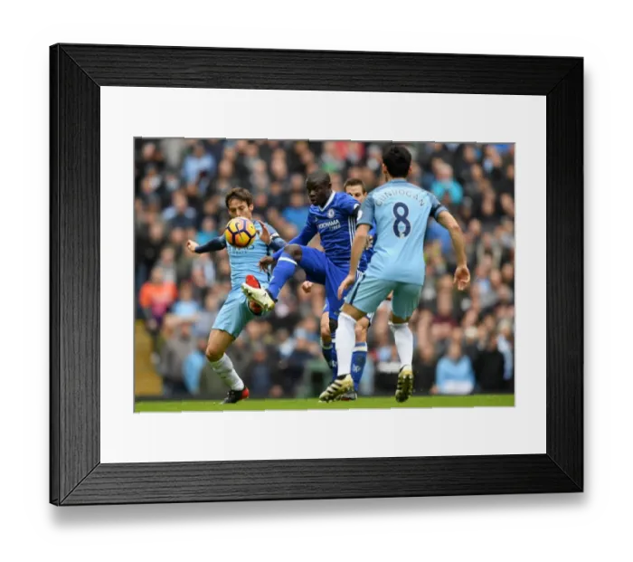Framed Print : Clash of Midfield Maestros: Kante vs. Silva - Manchester City vs. Chelsea, Premier League Framed Print : Clash of Midfield Maestros: Kante vs. Silva - Manchester City vs. Chelsea, Premier League
