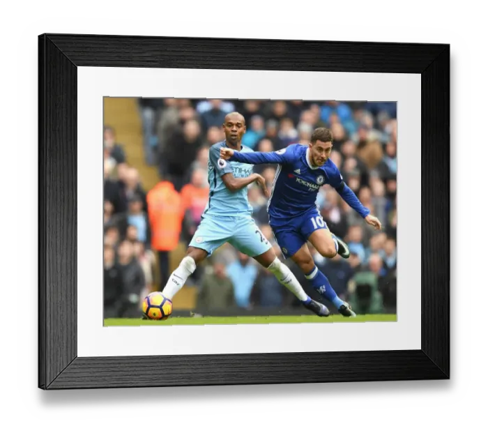 Framed Print : Hazard vs Fernandinho: A Premier League Showdown at Etihad Stadium