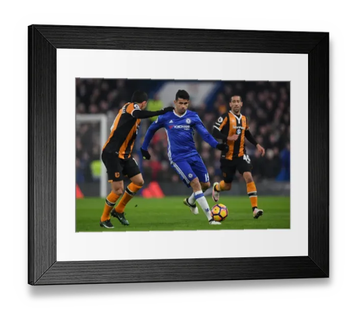 Framed Print : Diego Costa vs Omar Elabdellaoui: Intense Clash at Stamford Bridge - Chelsea vs Hull City, Premier League Framed Print : Diego Costa vs Omar Elabdellaoui: Intense Clash at Stamford Bridge - Chelsea vs Hull City, Premier League