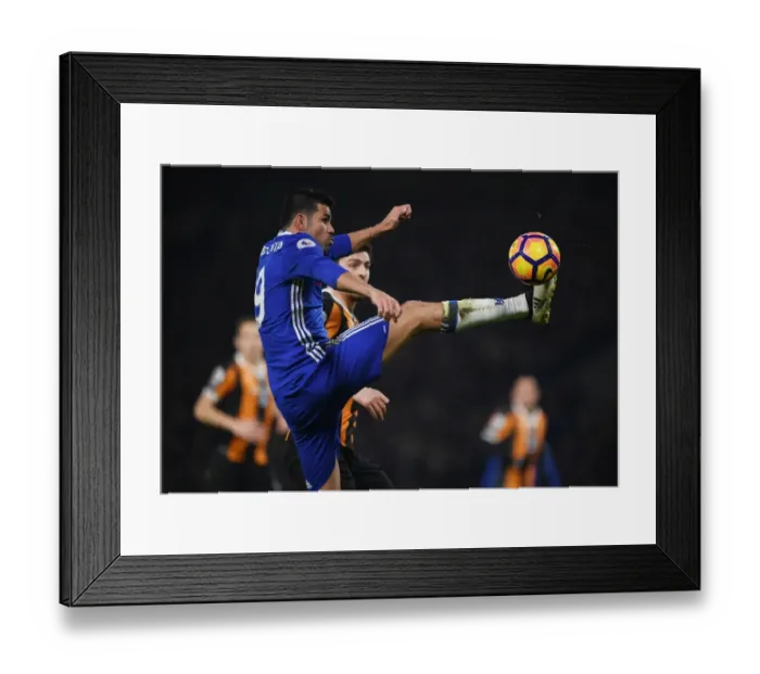 Framed Print : Diego Costa vs. Harry Maguire: Intense Face-Off in Chelsea's Battle Against Hull City Framed Print : Diego Costa vs. Harry Maguire: Intense Face-Off in Chelsea's Battle Against Hull City