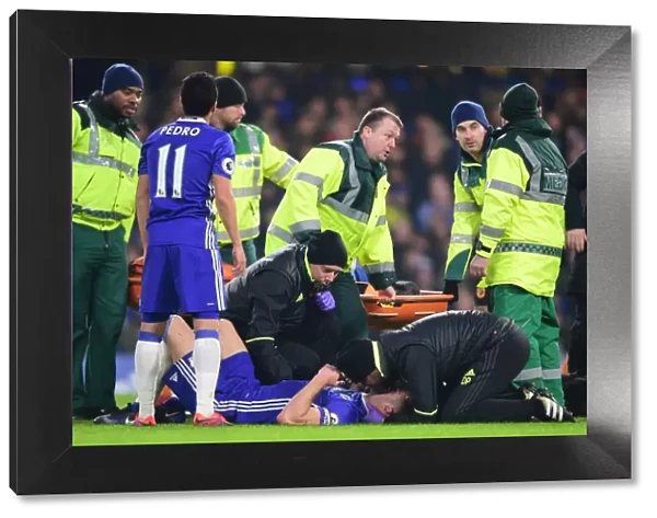 Chelsea's Gary Cahill Receives Medical Treatment After Collision with Hull City's Ryan Mason